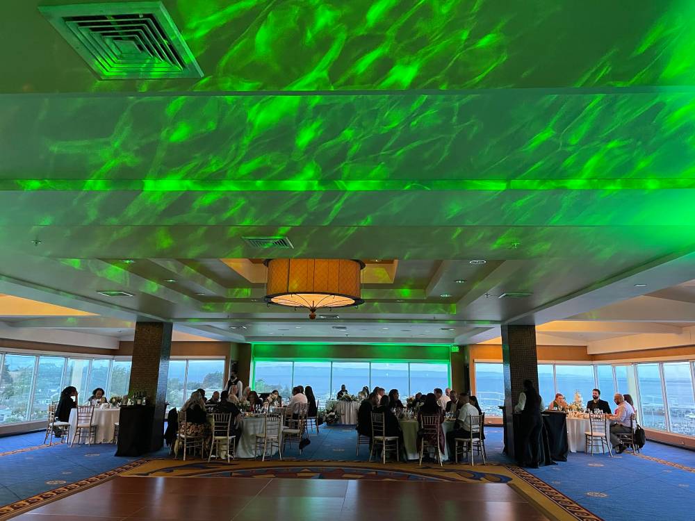 H2O Simulated Water Effect Projector in Green | LED Moonbeam Dance Floor Lighting | Dance floor lighting | Wedding Dance Floor Lighting | Uplighting provided by Wedding DJs and Party DJs DJ Enterprises Mobile Disc Jockey in Monterey, Carmel, Santa Cruz, Hollister | Event lighting for Conventions | uplighting for corporate holiday parties | Uplighting for Wedding Receptions, Anniversary and Retirement Parties. Birthday Party | Graduation and Mitzvahs. wedding DJ Justin Warwick of DJ Enterprises Mobile Disc Jockey in Monterey CA | Modern wedding ceremony and reception in Monterey, Carmel, and the Santa Cruz CA area | The Best Wedding DJs in Monterey | Local Monterey wedding DJs | Monterey wedding DJs | Carmel wedding DJs | Santa Cruz wedding DJs | Big Sur wedding DJs | Pebble Beach Wedding DJs | wedding uplighting | Photo Booth rental | Classic Photo Booth | Vintage Photo Booth