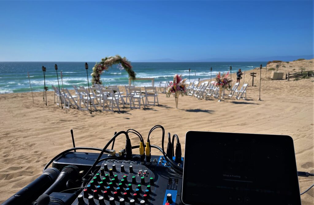 Beach ceremony and cocktails at the Sanctuary Beach Resort in Marina CA with wedding DJ Justin Warwick of DJ Enterprises Mobile Disc Jockey in Monterey CA | Wedding Games | Modern wedding ceremony and reception in Monterey, Carmel, and the Santa Cruz CA area Monterey wedding DJs | Carmel wedding DJs | Santa Cruz wedding DJs | Big Sur wedding DJs