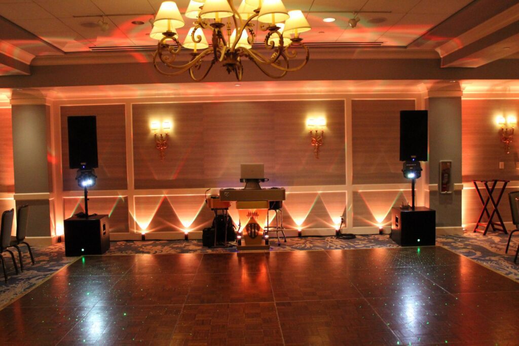 LED up lighting at the Monterey Plaza Hotel in Monterey California, provided by wedding DJs, DJ Enterprises Mobile Disc Jockey and Luxury Photo Booth rental | with wedding DJ Justin Warwick in Monterey CA | Modern wedding ceremony and reception in Monterey, Carmel, and the Santa Cruz CA area | Monterey wedding DJs | Carmel wedding DJs | Santa Cruz wedding DJs | Big Sur wedding DJs | Pebble Beach Wedding DJs | wedding uplighting | Photo Booth rental | Classic Photo Booth | Vintage Photo Booth