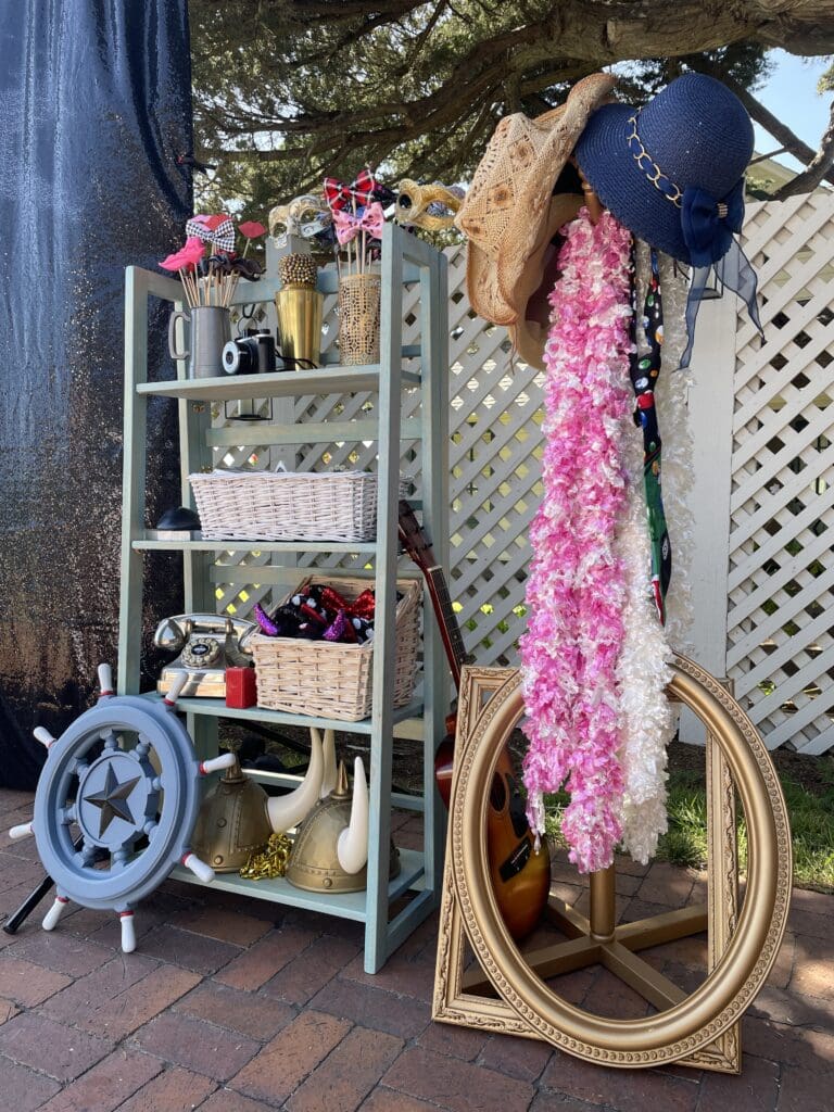 Vintage Wedding Photo Booth Prop Display at the Mission Ranch in Carmel-by-the-Sea, California. Awesome Sauce Photo Booth rental provided by DJ Enterprises Mobile Disc Jockey in Monterey, California.