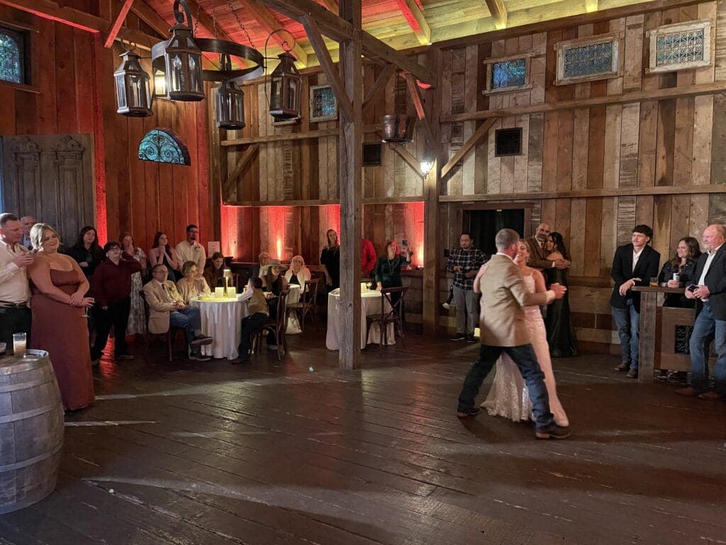 Wedding first dance in the barn at Waterfall Lodge and Retreat, Ben Lomond, California | The Redwood Cathedral, outdoor wedding ceremony site. Ben Lomond wedding DJs | Santa Cruz wedding DJs | music by DJ Enterprises Mobile Disc Jockey & photo booth