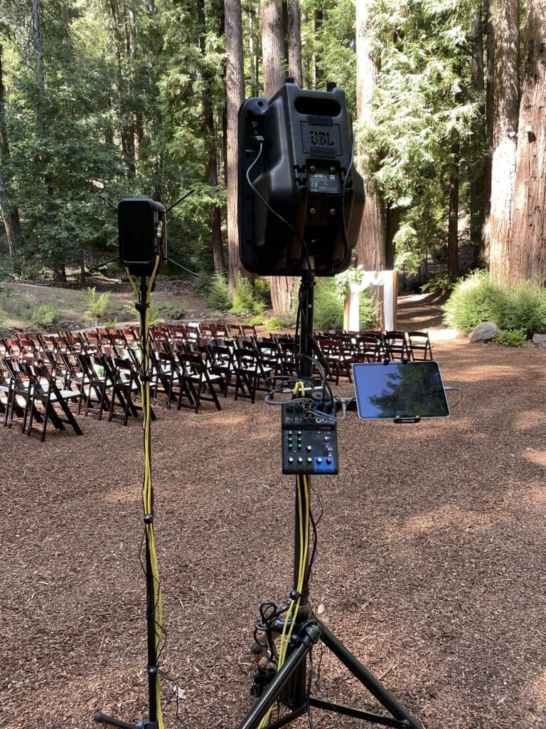 Outdoor wedding ceremony sound system at the Redwood Cathedral, Waterfall Lodge wedding venue in Ben Lomond, CA