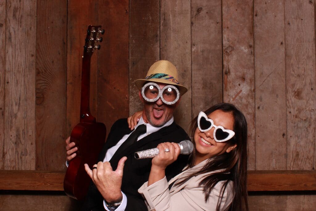 Icebreaker Photo Booth @ Waterfall Lodge and Retreat with wood wall as a Backdrop | Santa Cruz Wedding DJ | Ben Lomond wedding DJs | all inclusive wedding DJ and photo booth package at Waterfall Lodge and Retreat, the "Waterfall Package" | Vintage photo booth rentals in Santa Cruz | Santa Cruz wedding photo booth