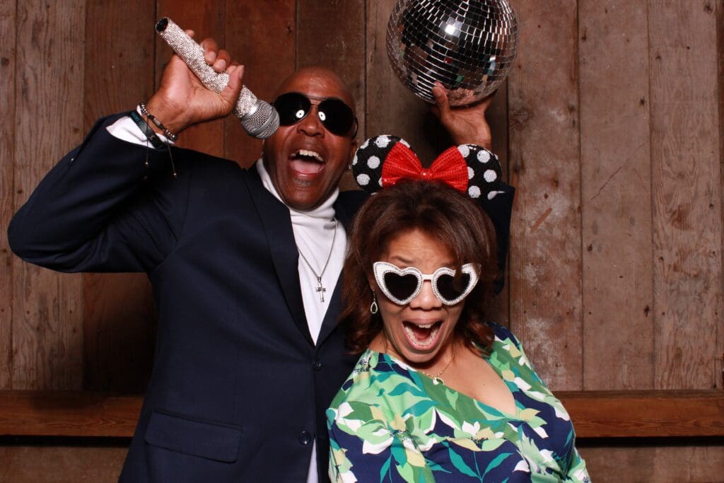 Icebreaker Photo Booth @ Waterfall Lodge and Retreat with wood wall as a Backdrop | Santa Cruz Wedding DJ | Ben Lomond wedding DJs | all inclusive wedding DJ and photo booth package at Waterfall Lodge and Retreat, the "Waterfall Package" | Vintage photo booth rentals in Santa Cruz | Santa Cruz wedding photo booth