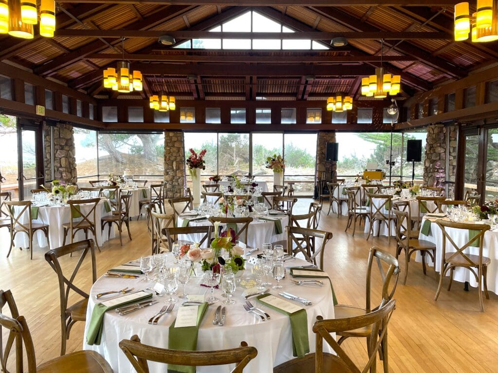 Seascape room set for wedding reception