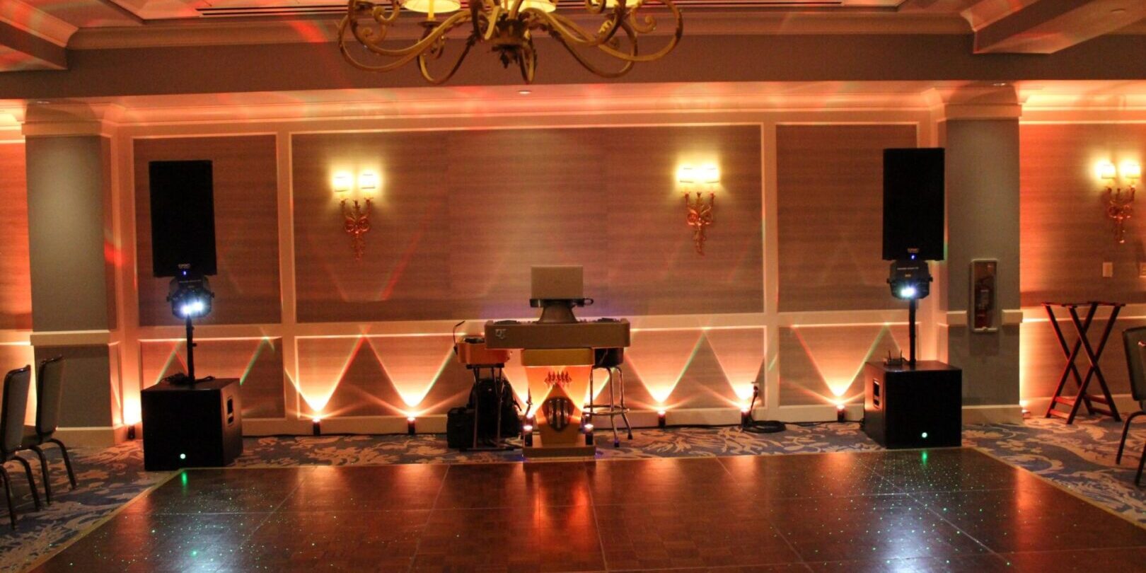 LED up lighting at the Monterey Plaza Hotel in Monterey California, provided by wedding DJs, DJ Enterprises Mobile Disc Jockey and Luxury Photo Booth rental
